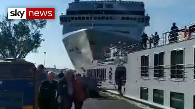 Cruise ship crashes into dock and tourist boat in venice Cruise ship crashes into dock and tourist boat in venice