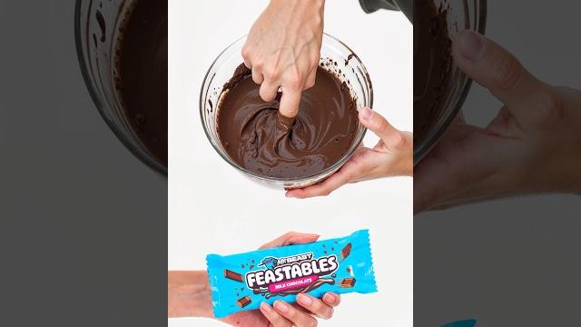 Most expensive hand model holds feastables Most expensive hand model holds feastables