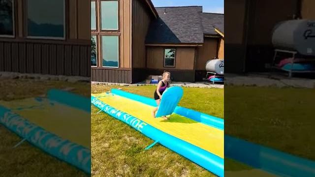 Cute twin girls playing super slip n slide #outdooractivities #shorts #twingirls #slipnslide #short Cute twin girls playing super slip n slide #outdooractivities #shorts #twingirls #slipnslide #short