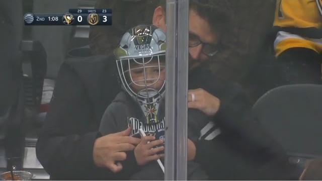 Small boy gets hit by puck, golden knights give him goalie mask Small boy gets hit by puck, golden knights give him goalie mask