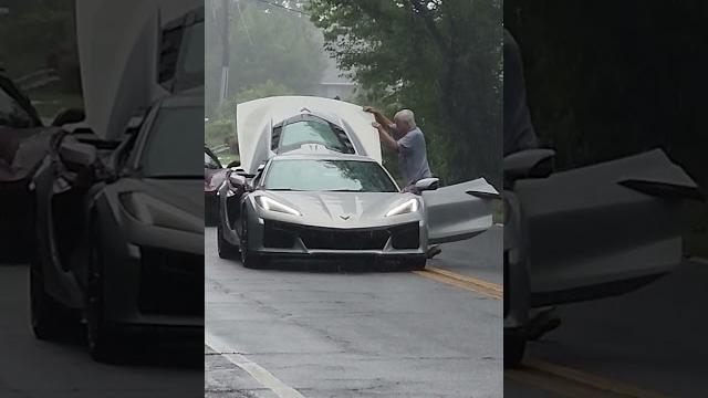 Topless & wet! byron panicks to protect his $200k corvette during a rain storm at 4th july parade! Topless & wet! byron panicks to protect his $200k corvette during a rain storm at 4th july parade!