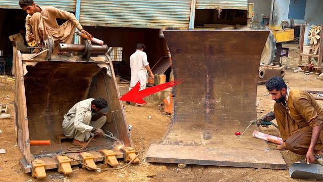 We break aqua cruise ship and make a excavator bucket from high strength sheets of ship We break aqua cruise ship and make a excavator bucket from high strength sheets of ship
