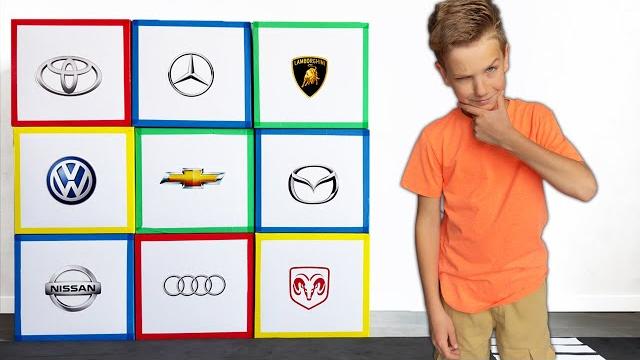 Mark learn popular car brands with cardboard garages Mark learn popular car brands with cardboard garages