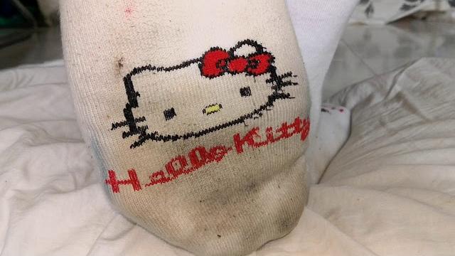 Dirty kitty socks trample on pillow Dirty kitty socks trample on pillow