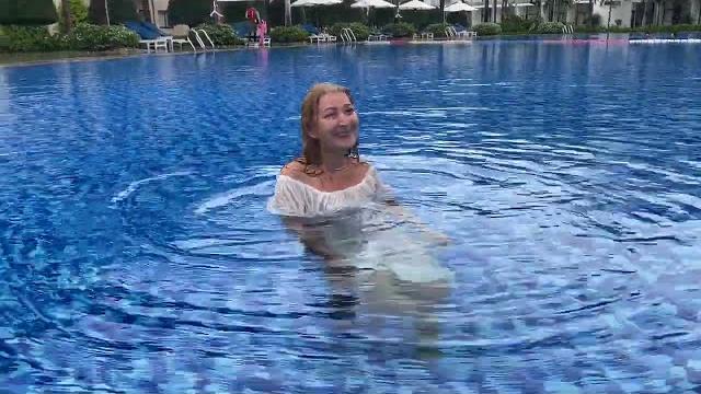 Wetlook walking on a rainy day in a white wet dress #wet #dress #girl #swimmingpool #wetlook Wetlook walking on a rainy day in a white wet dress #wet #dress #girl #swimmingpool #wetlook