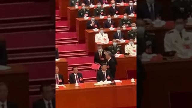 胡锦涛被“请”出会场。 胡锦涛被“请”出会场。