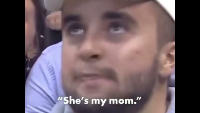 He got put on the kiss cam with his mom He got put on the kiss cam with his mom