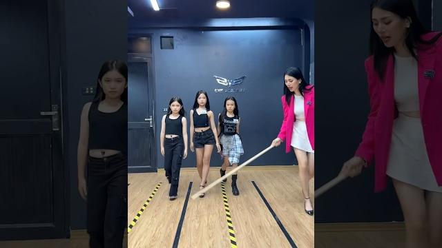 3 cool child models practicing their catwalk 3 cool child models practicing their catwalk