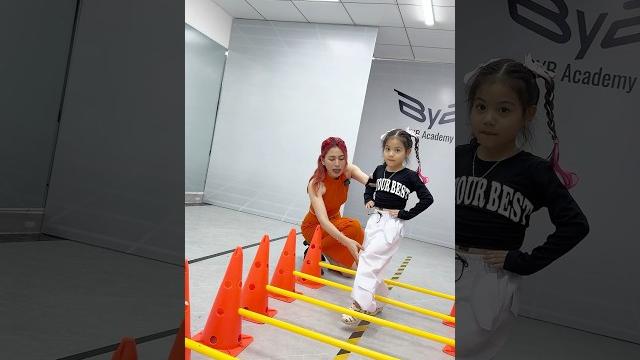 Adorable child model learning catwalk Adorable child model learning catwalk