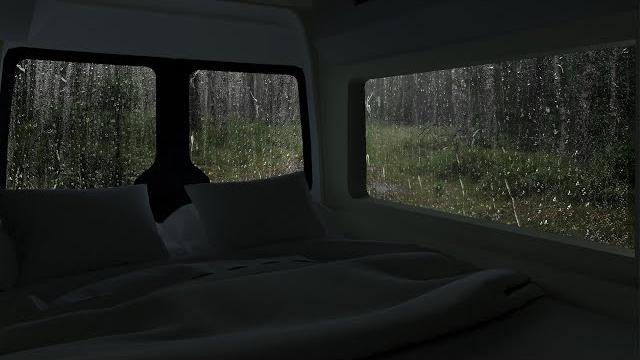 Rain on windows of car for camping in forest | car camping Rain on windows of car for camping in forest | car camping