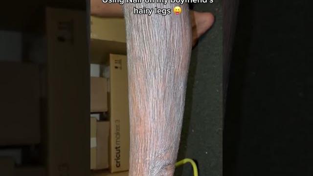 Girl uses nair on her boyfriend's hairy legs! #shorts Girl uses nair on her boyfriend's hairy legs! #shorts