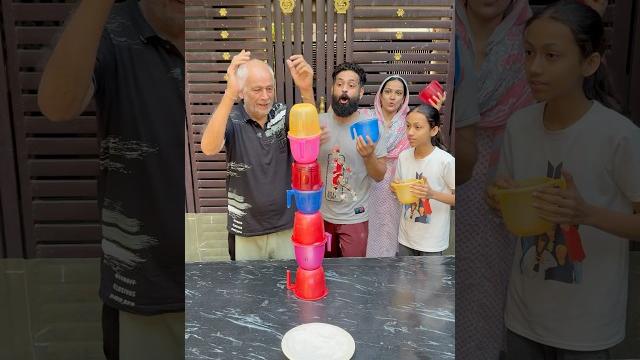 Build a tower with tub challenge, who has the best hand balance? #familygames #familychallenge Build a tower with tub challenge, who has the best hand balance? #familygames #familychallenge