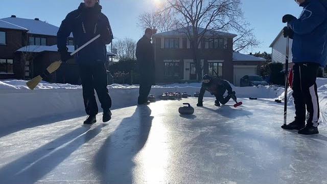 Montreal family turns lawn into curling sheet Montreal family turns lawn into curling sheet
