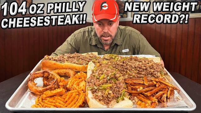 Eat a 104oz 30-inch philly cheesesteak sandwich to break carnival cafe’s challenge record!! Eat a 104oz 30-inch philly cheesesteak sandwich to break carnival cafe’s challenge record!!