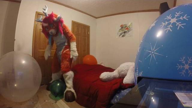 Fursuiter popping balloons Fursuiter popping balloons
