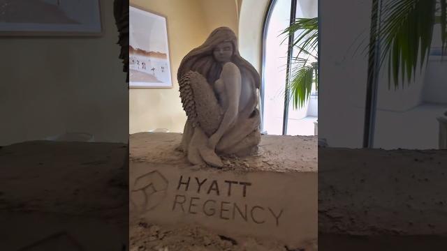 Making a mermaid out of a block of sand Making a mermaid out of a block of sand