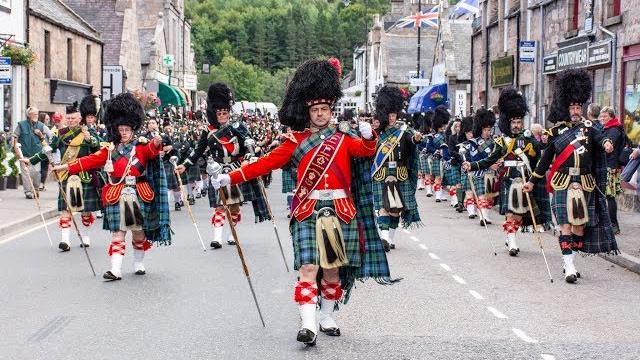Massed pipes & drums parade through deeside town to start the ballater highland games 2018 Massed pipes & drums parade through deeside town to start the ballater highland games 2018