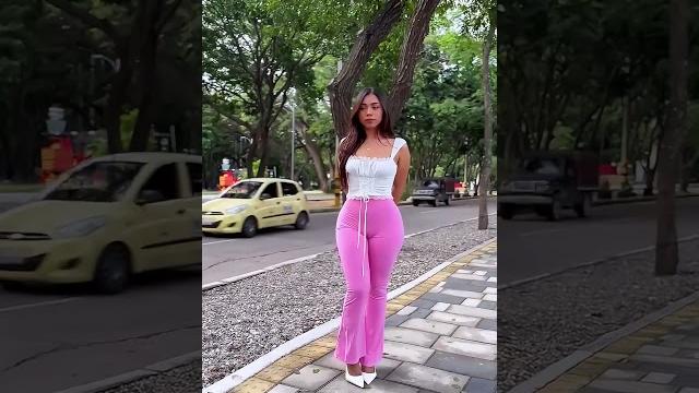 Beautiful model is tight pink bell bottom pants street style outfit #fashion #style #outfit #shorts Beautiful model is tight pink bell bottom pants street style outfit #fashion #style #outfit #shorts