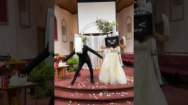 Married tv woman and cameraman dancing Married tv woman and cameraman dancing