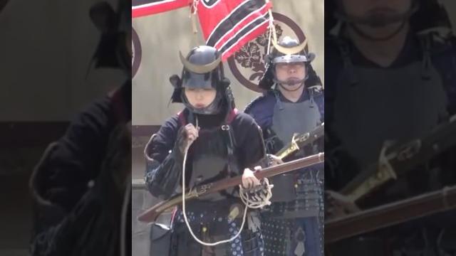 Japanese girl fires a matchlock gun Japanese girl fires a matchlock gun