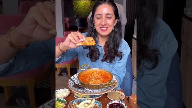 Indian girl trying turkish breakfast in london Indian girl trying turkish breakfast in london