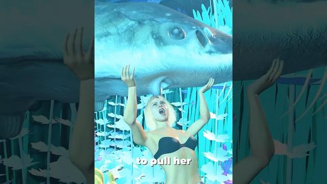 A woman's head swallowed by a big fish A woman's head swallowed by a big fish