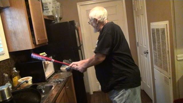 Angry grandpa destroys microwave! Angry grandpa destroys microwave!