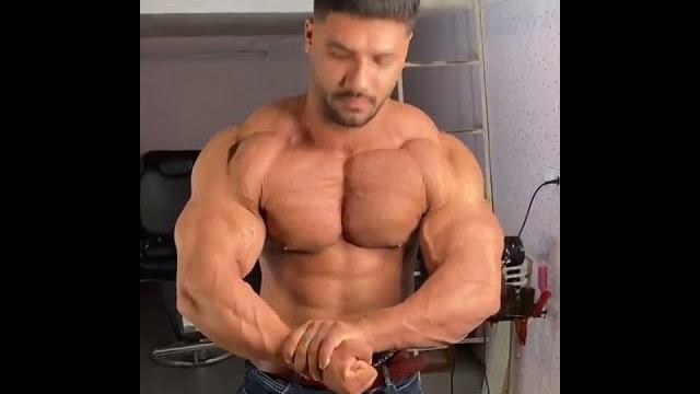 Huge young muscle stud pec bounce and pose Huge young muscle stud pec bounce and pose