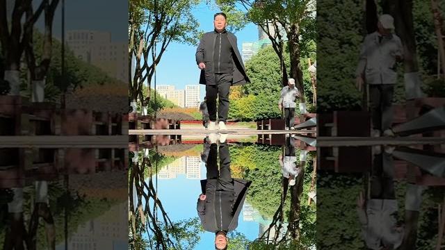 公园散步时试试这样拍摄情趣小视频…即兴随拍公园小小摇控器一个走路的样子手机摄影 公园散步时试试这样拍摄情趣小视频…即兴随拍公园小小摇控器一个走路的样子手机摄影
