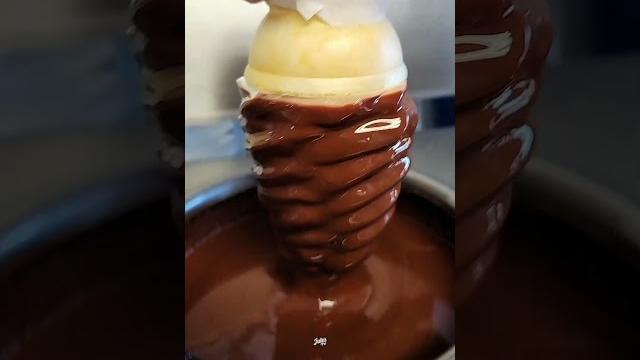 Ice cream chocolate cone dipping Ice cream chocolate cone dipping