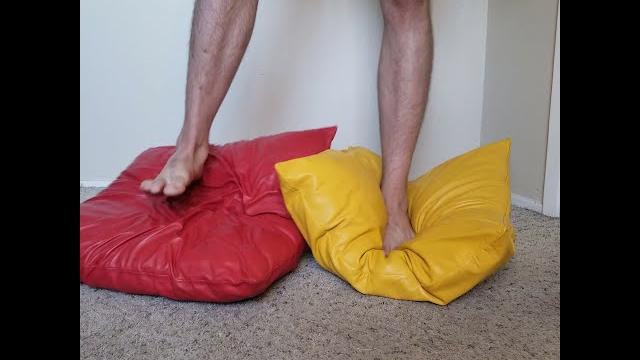 Feet trample leather pillows Feet trample leather pillows