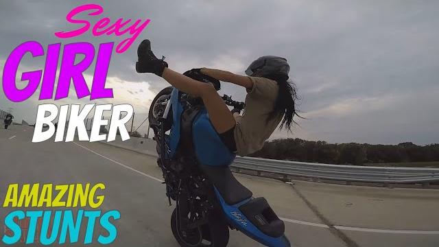 Beautiful girl biker performs amazing highway motorcycle stunts riding long stunt bike wheelies Beautiful girl biker performs amazing highway motorcycle stunts riding long stunt bike wheelies