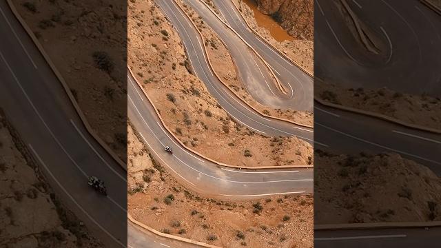 Sharp turns, red cliffs, mint tea above the madness. this is #morocco: wild, bold, and unforgettable Sharp turns, red cliffs, mint tea above the madness. this is #morocco: wild, bold, and unforgettable