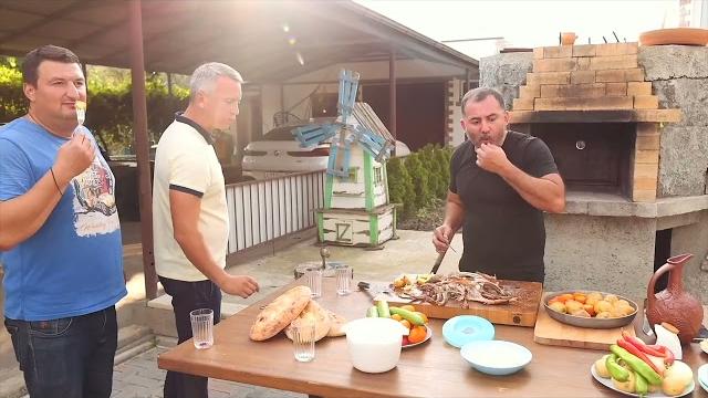 Meat in wine. lamb in an oven. roasting lamb in a country oven Meat in wine. lamb in an oven. roasting lamb in a country oven