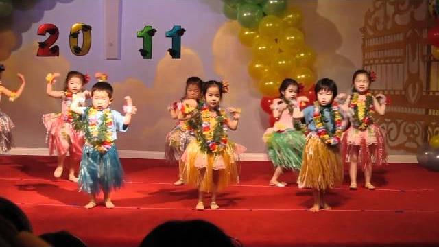 Sarah hula dances at her pre-school's graduation ceremony Sarah hula dances at her pre-school's graduation ceremony