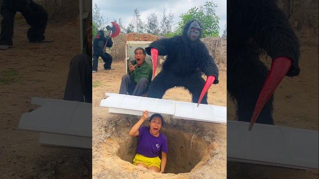 2 ferocious gorilla monsters attack brave girl and poor scared old man hiding in the back hole 2 ferocious gorilla monsters attack brave girl and poor scared old man hiding in the back hole