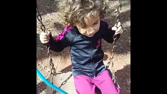 Minha filha brincando no parque Minha filha brincando no parque