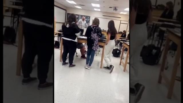 Teacher gets mad and throws desk Teacher gets mad and throws desk