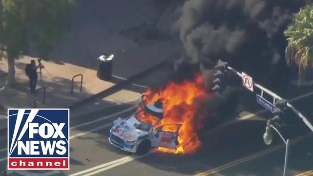 ‘unlawful assembly’: cars set on fire in la as anti-ice protests continue for 3rd straight day ‘unlawful assembly’: cars set on fire in la as anti-ice protests continue for 3rd straight day