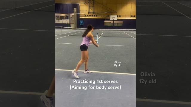 Tennis first serve practice - olivia 12y old junior player - body serves target training Tennis first serve practice - olivia 12y old junior player - body serves target training