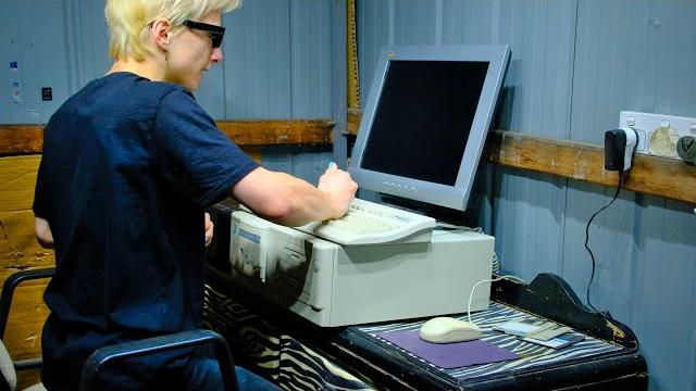 Angry office man destroys faulty computer setup Angry office man destroys faulty computer setup