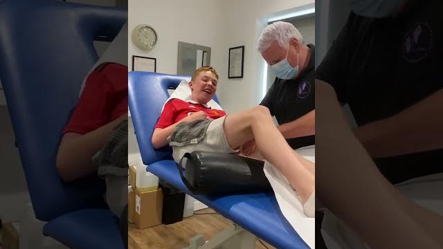 Ticklish boy giggles throughout sports massage session Ticklish boy giggles throughout sports massage session