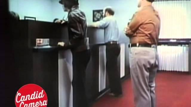 Candid camera classic: stuck on bank line Candid camera classic: stuck on bank line