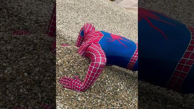 Spiderman’s head stuck in sand Spiderman’s head stuck in sand