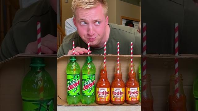 Mountain dew hot sauce roulette! #shorts #game #challenge #prank Mountain dew hot sauce roulette! #shorts #game #challenge #prank