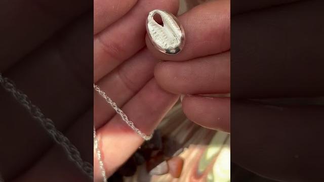 Shiny silver shell pendant Shiny silver shell pendant