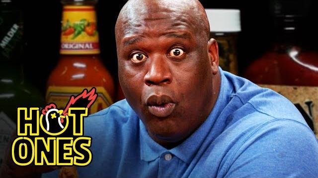 Shaq tries to not make a face while eating spicy wings | hot ones Shaq tries to not make a face while eating spicy wings | hot ones