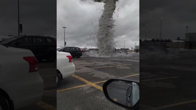 Small tornado on a parking lot Small tornado on a parking lot
