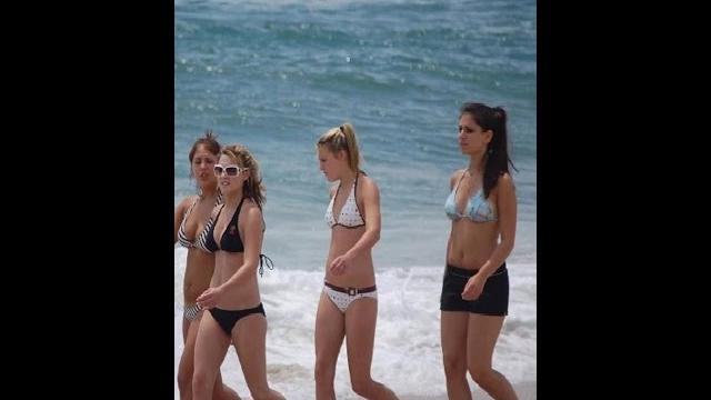 Girl walking beach hot day Girl walking beach hot day
