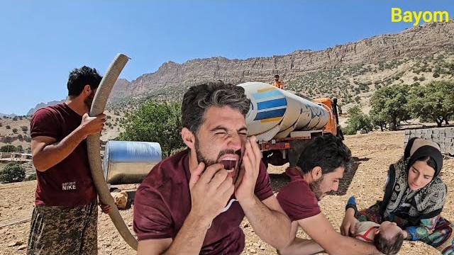 ### "thirst in the heart of displacement: shahin saves jahanbakhsh's family in water crisis" ### "thirst in the heart of displacement: shahin saves jahanbakhsh's family in water crisis"